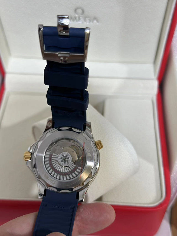 42mm Stainless Steel & Yellow Gold Case paired With Blue Rubber Strap Watch
