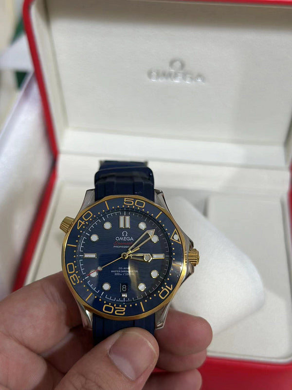 42mm Stainless Steel & Yellow Gold Case paired With Blue Rubber Strap Watch