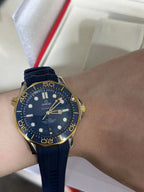 42mm Stainless Steel & Yellow Gold Case paired With Blue Rubber Strap Watch
