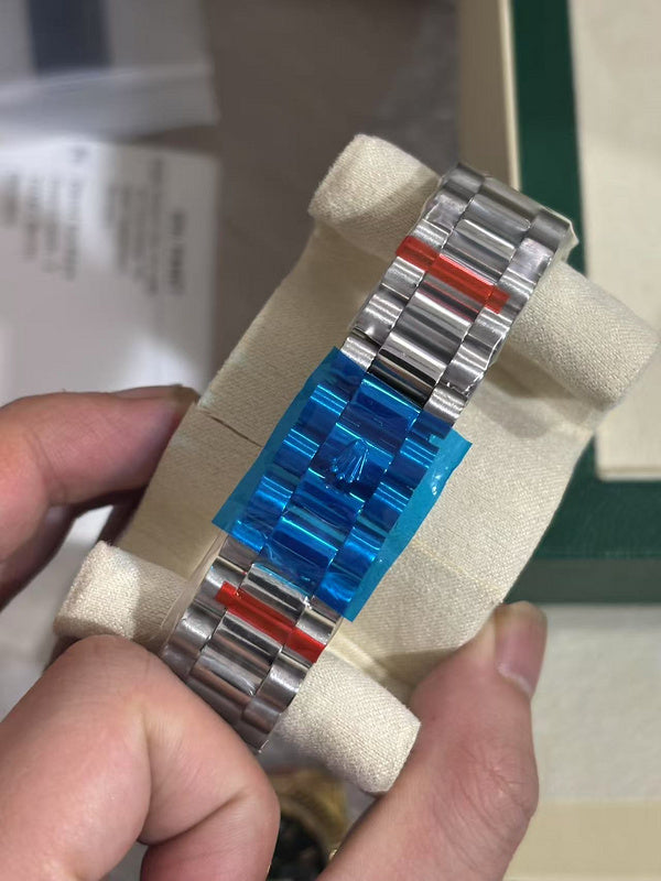 Platinum Day-Date 40 Baguette Diamond Bezel Watch