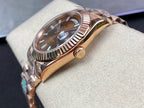 Day-Date 40mm Rose Gold Chocolate Baguette Dial Watch