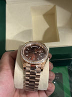 Day-Date 40mm Rose Gold Brown Baguette Dial Diamond Bezel Watch