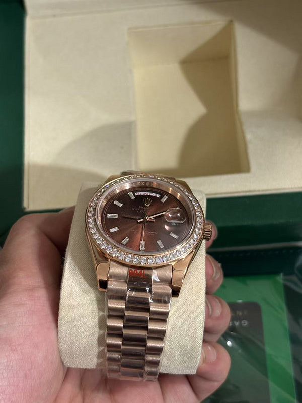 Day-Date 40mm Rose Gold Brown Baguette Dial Diamond Bezel Watch