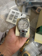 Platinum Day-Date 40 Baguette Diamond Bezel Watch