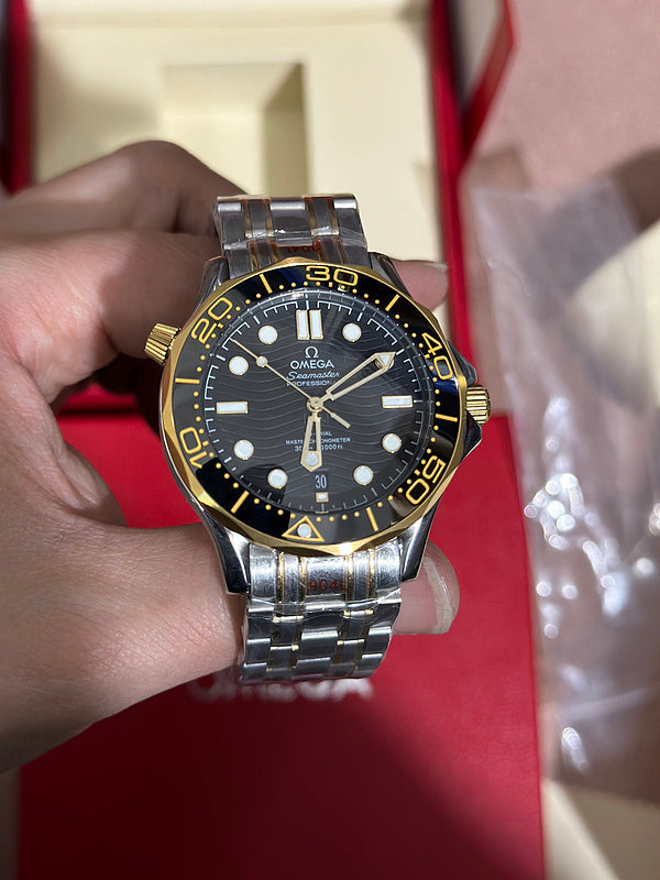 Steel and Yellow Gold Case Bracelet With Black Ceramic Dial Bezel Watch