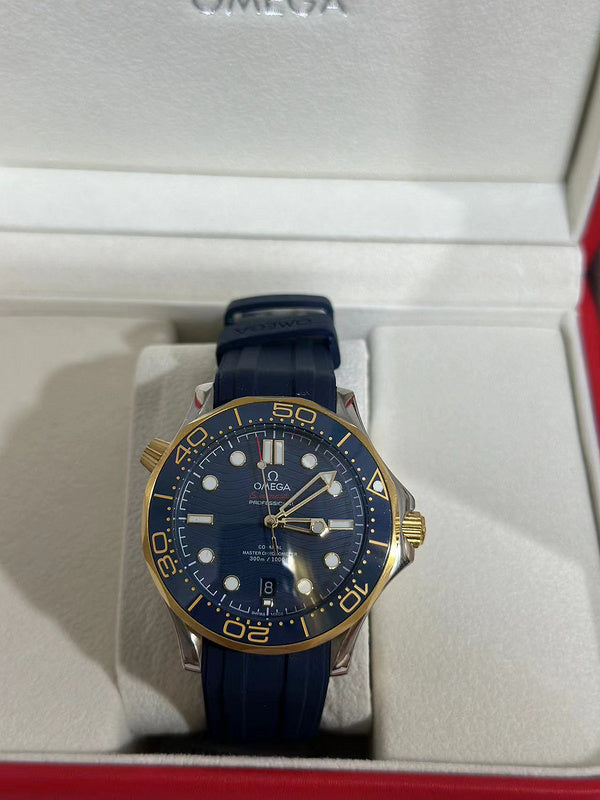 42mm Stainless Steel & Yellow Gold Case paired With Blue Rubber Strap Watch