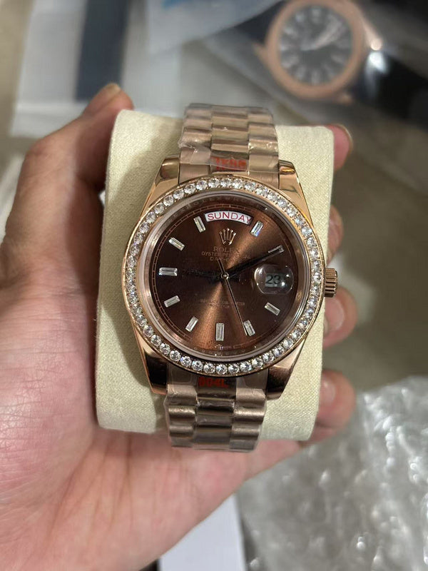 Day-Date 40mm Rose Gold Brown Baguette Dial Diamond Bezel Watch
